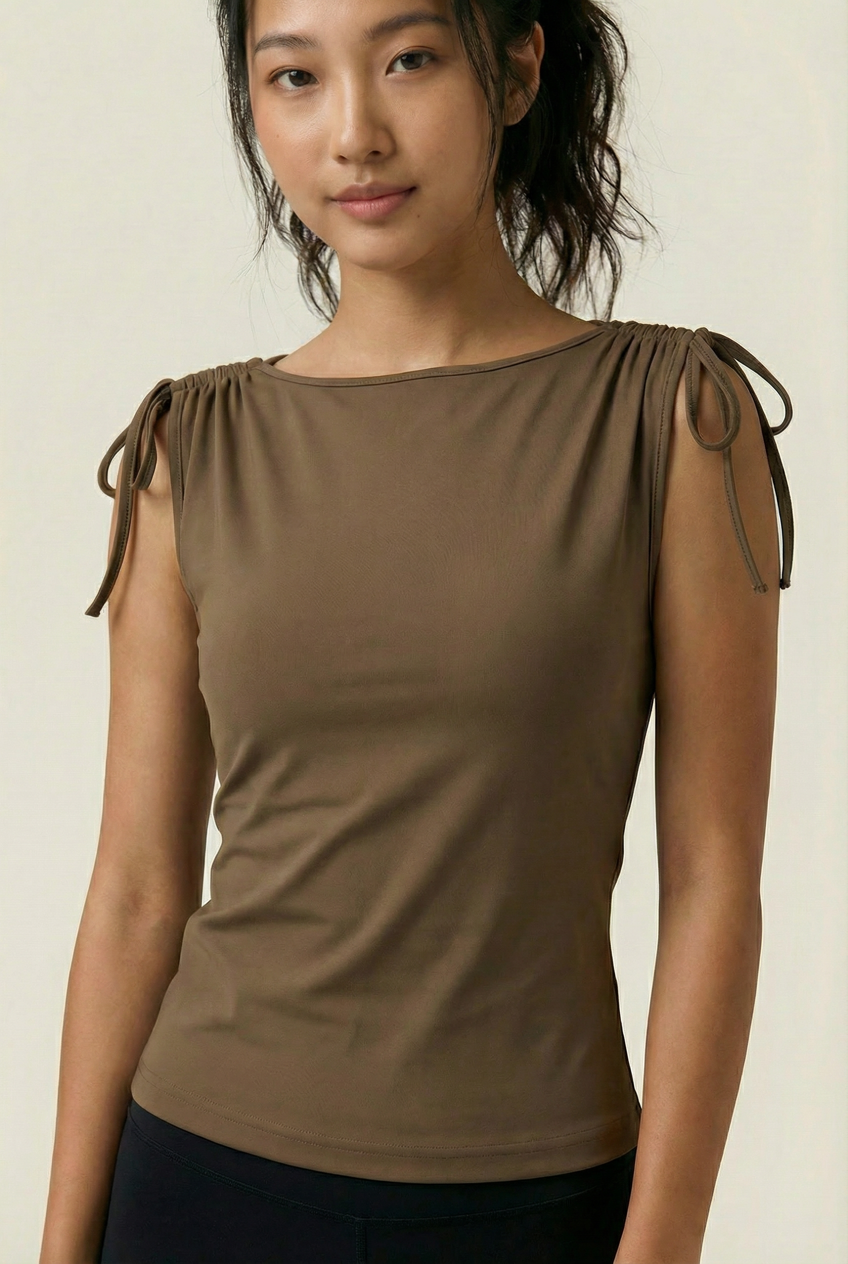 Brown boat neck top with gathered shoulder straps for adjustment