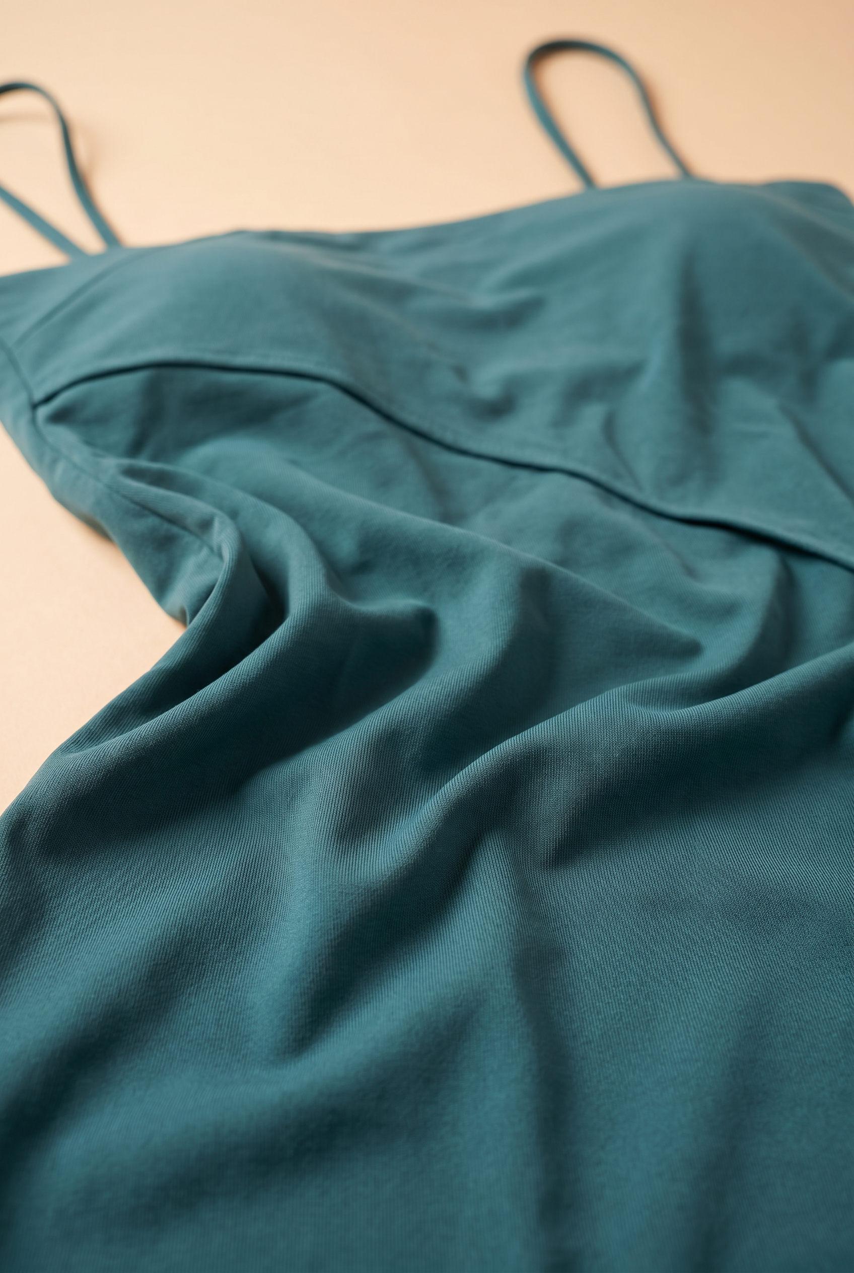 Teal thin strap top close up, fabric shot